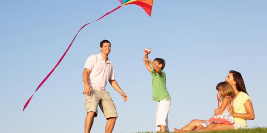 Family flying a kite