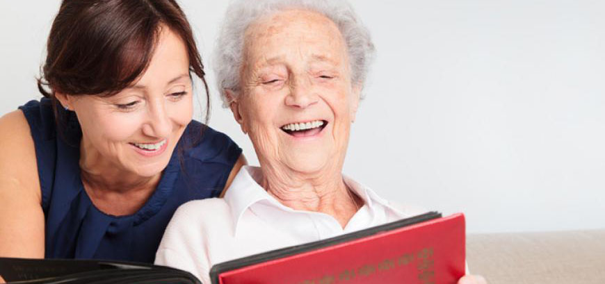 Caregiver reading to cared for