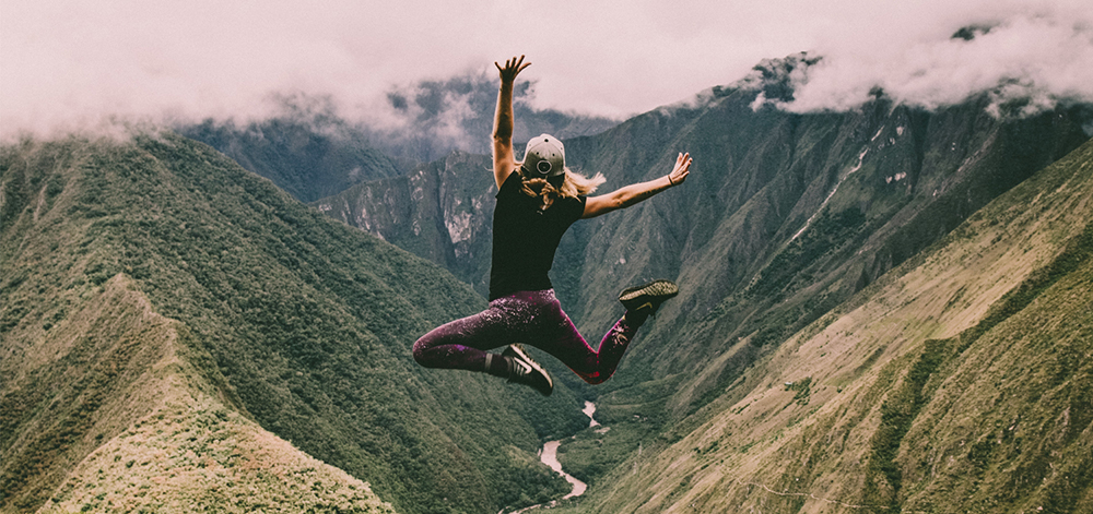 Women jumping into the air