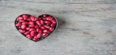 Heart Bowl Filled of Pomegranate Seeds